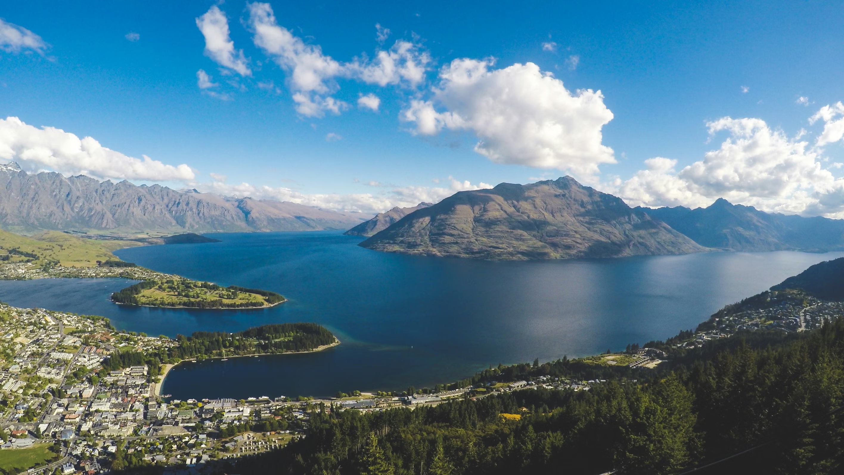 Aerial view of Queenstown and Lake Wakatipu ringed by the Southern Alps